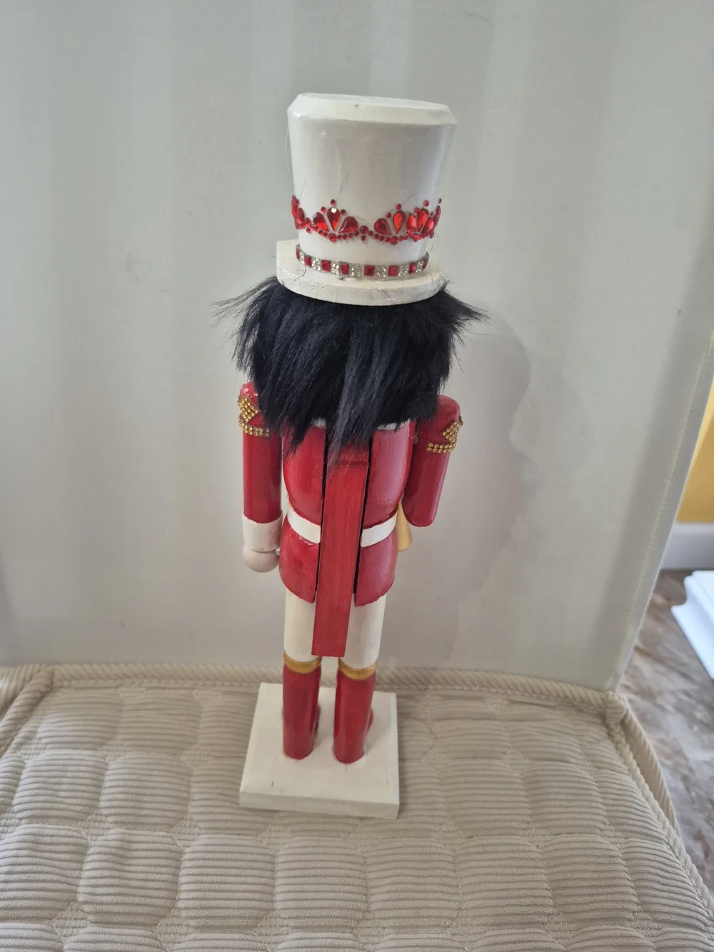 Red and White Nutcracker Holiday Figurine With Horn